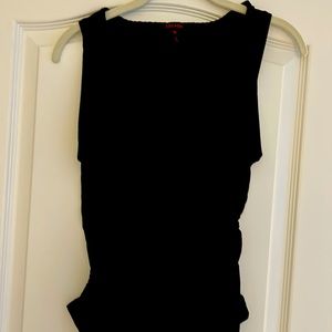 Black escada top w cute design around the v-neck